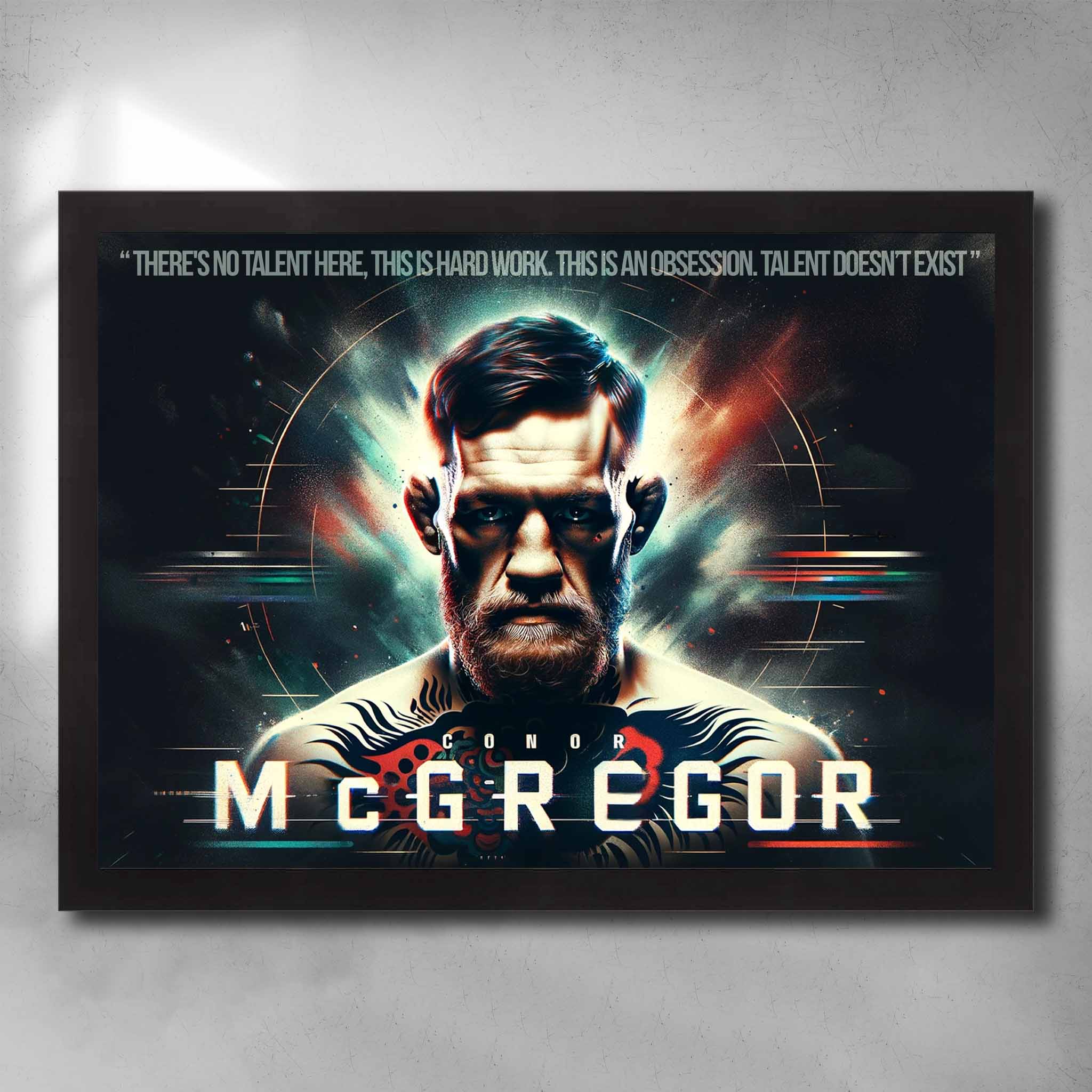 Black framed UFC art by Sports Cave featuring the notorious Conor Mcgregor with his quote "there's no talent here, this is hard work".