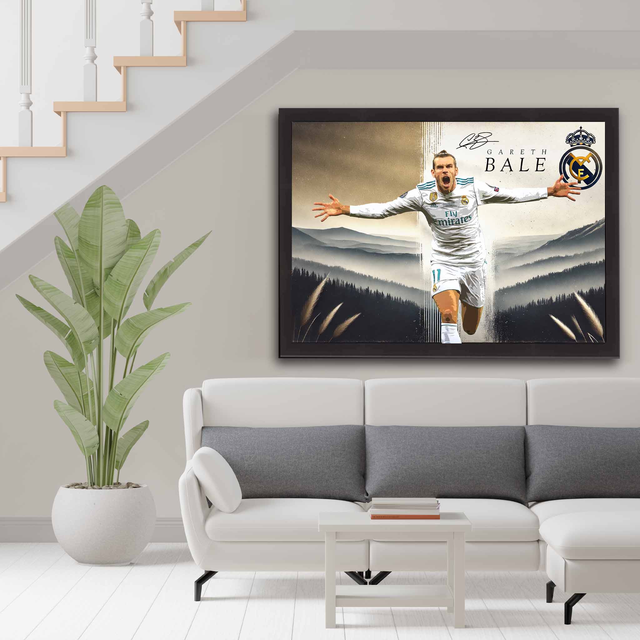 Framed Gareth Bale Real Madrid art poster displayed in a modern living room setting. The poster features Gareth Bale in his iconic Real Madrid jersey celebrating, with the Real Madrid logo and Bale's signature. 