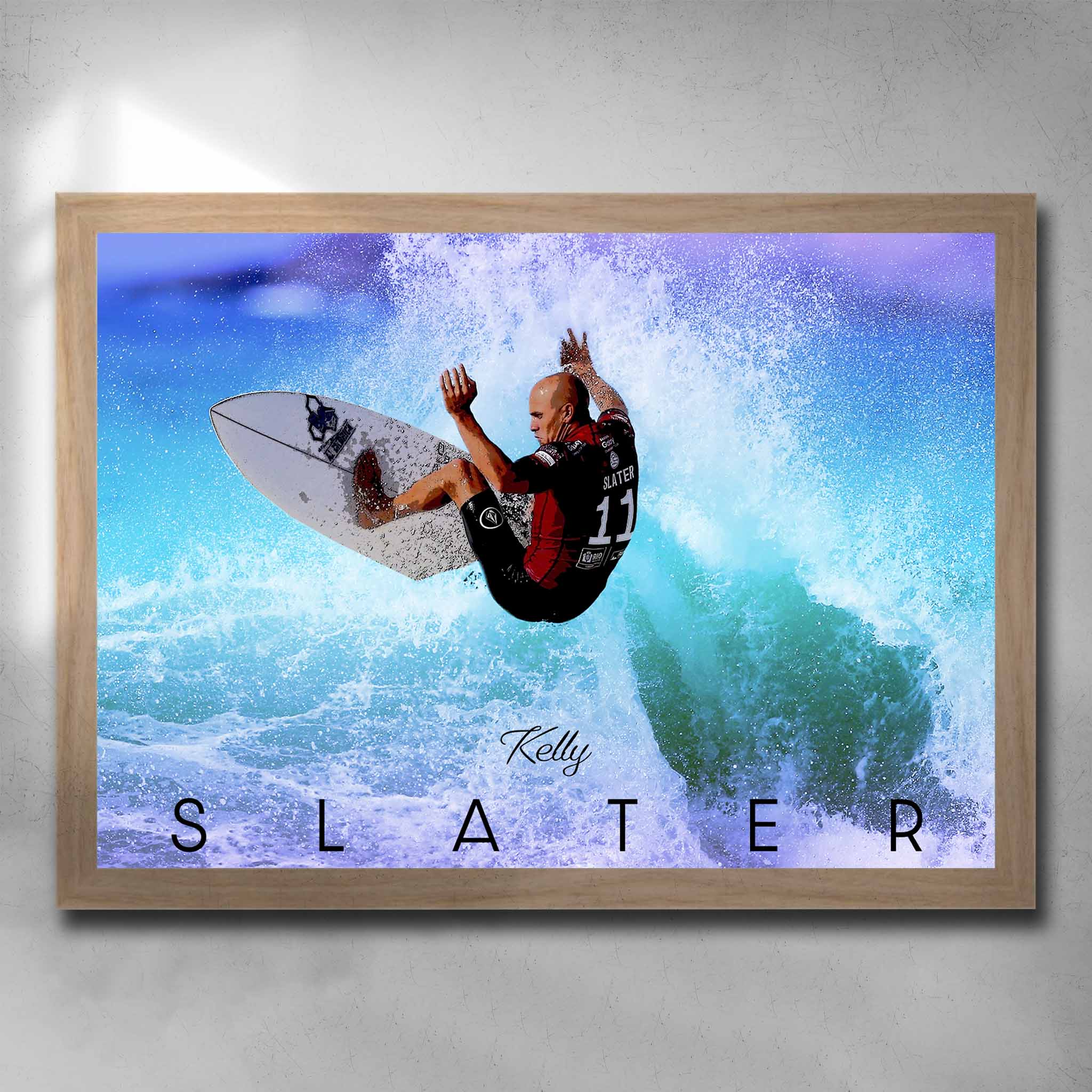 Oak framed surfing art by Sports Cave, featuring the legend Kelly Slater riding a wave.