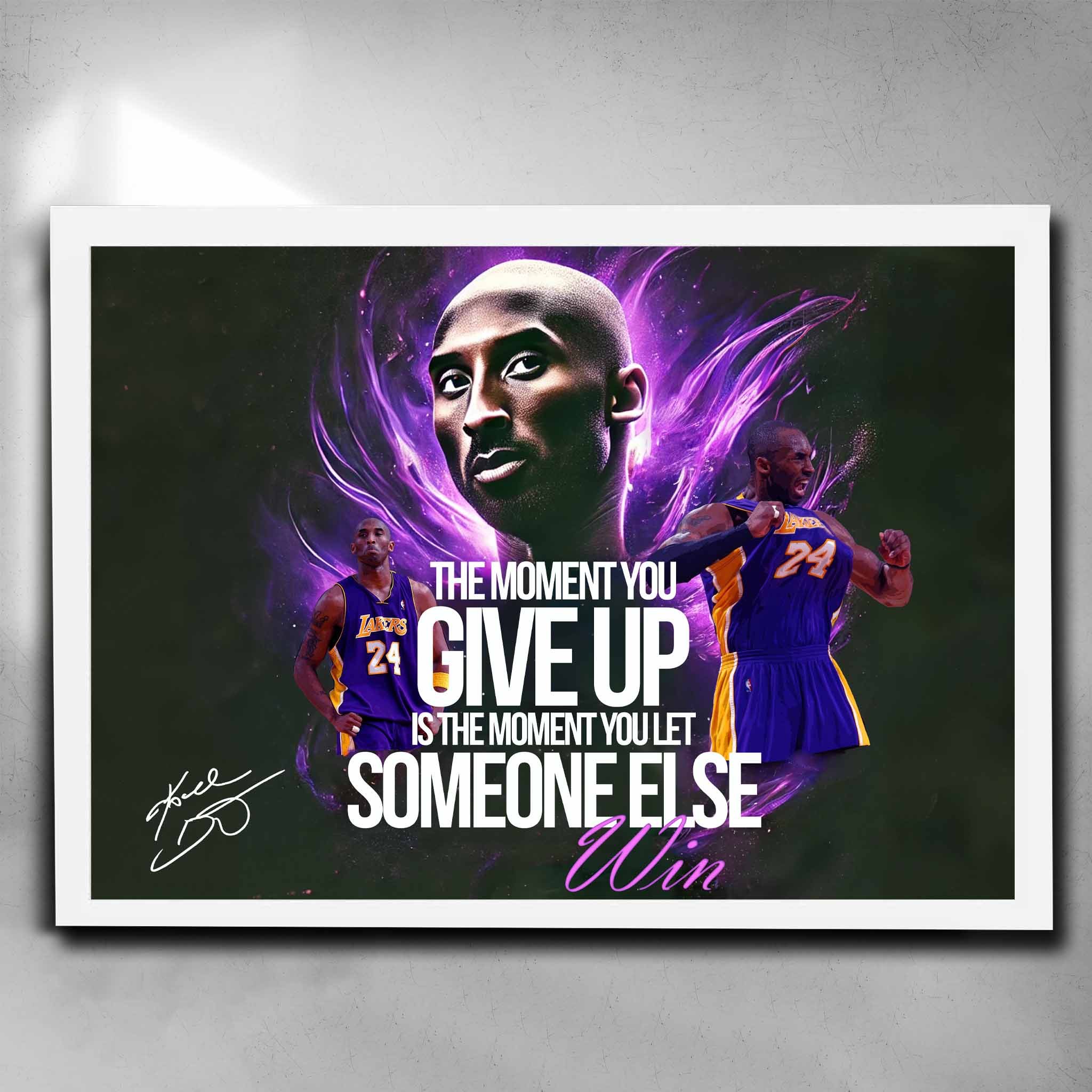 White framed motivational art by Sports Cave, featuring Kobe Bryant with his inspirational quote "The moment you give up is the moment you let someone else win."