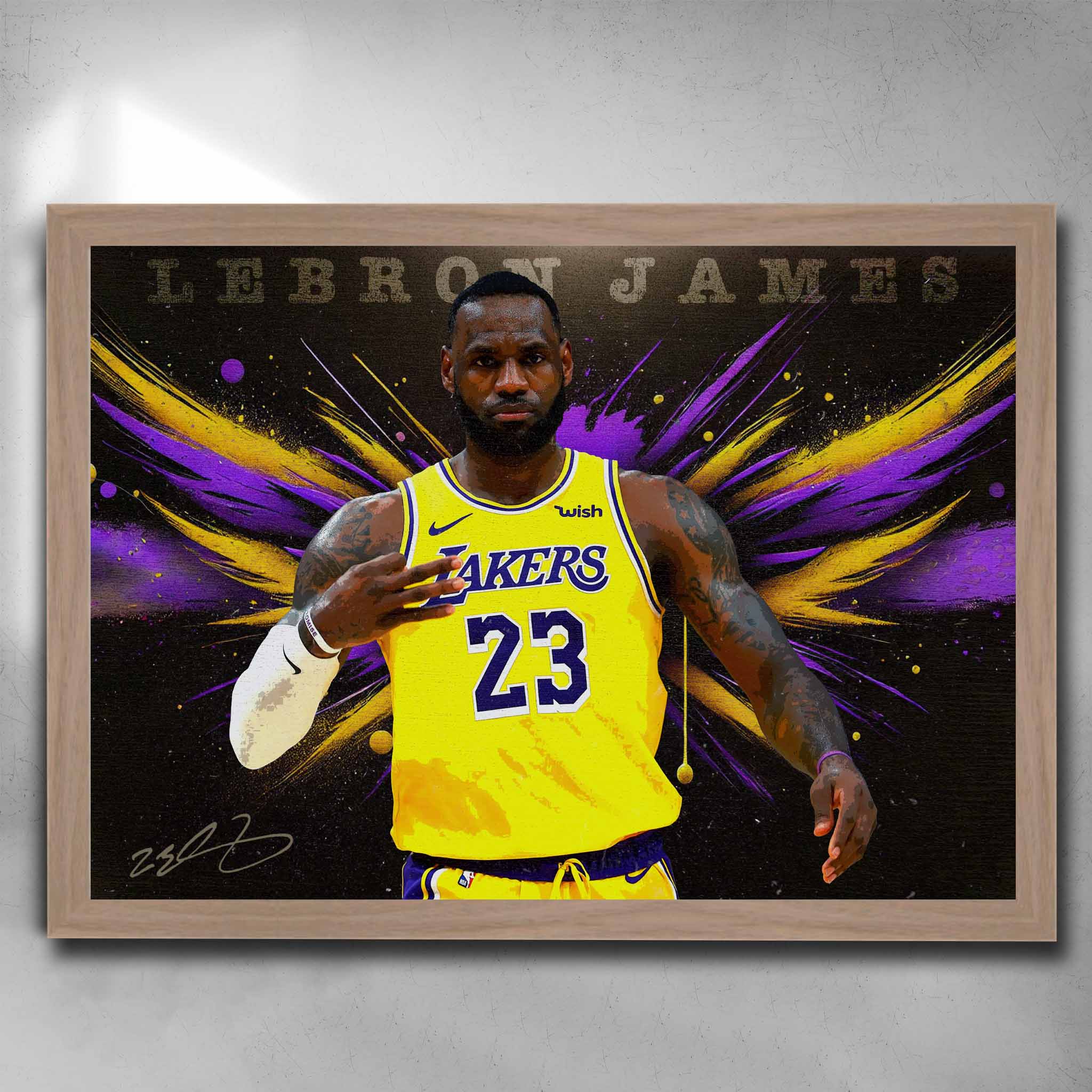 LeBron James iconic Lakers wall art in oak frame – NBA star poster with purple and yellow splatter design.