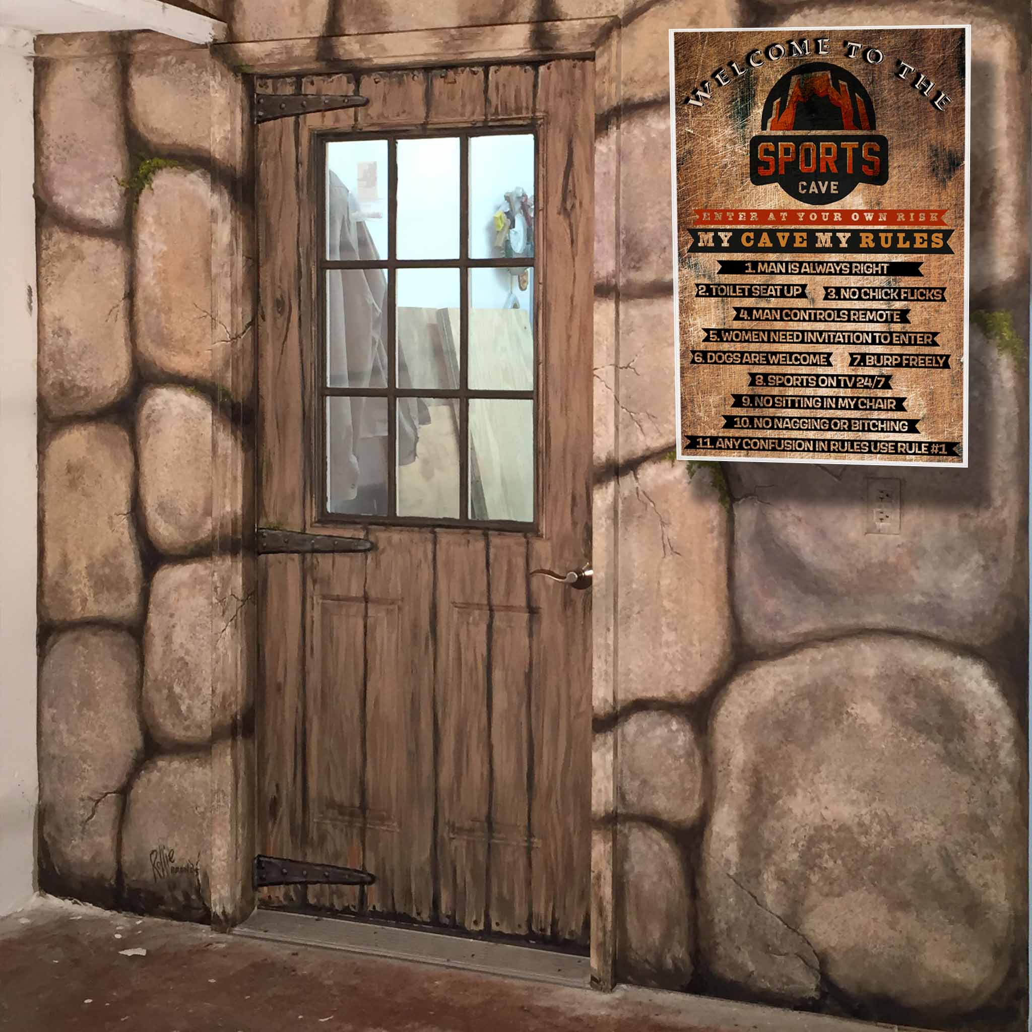 A "Man Cave" sign on a stone wall next to a wooden door lists humorous rules such as "Man is always right," "No chick flicks," and "Sports on TV 24/7." The sign is titled "Welcome to the Sports Cave" with a rustic design.