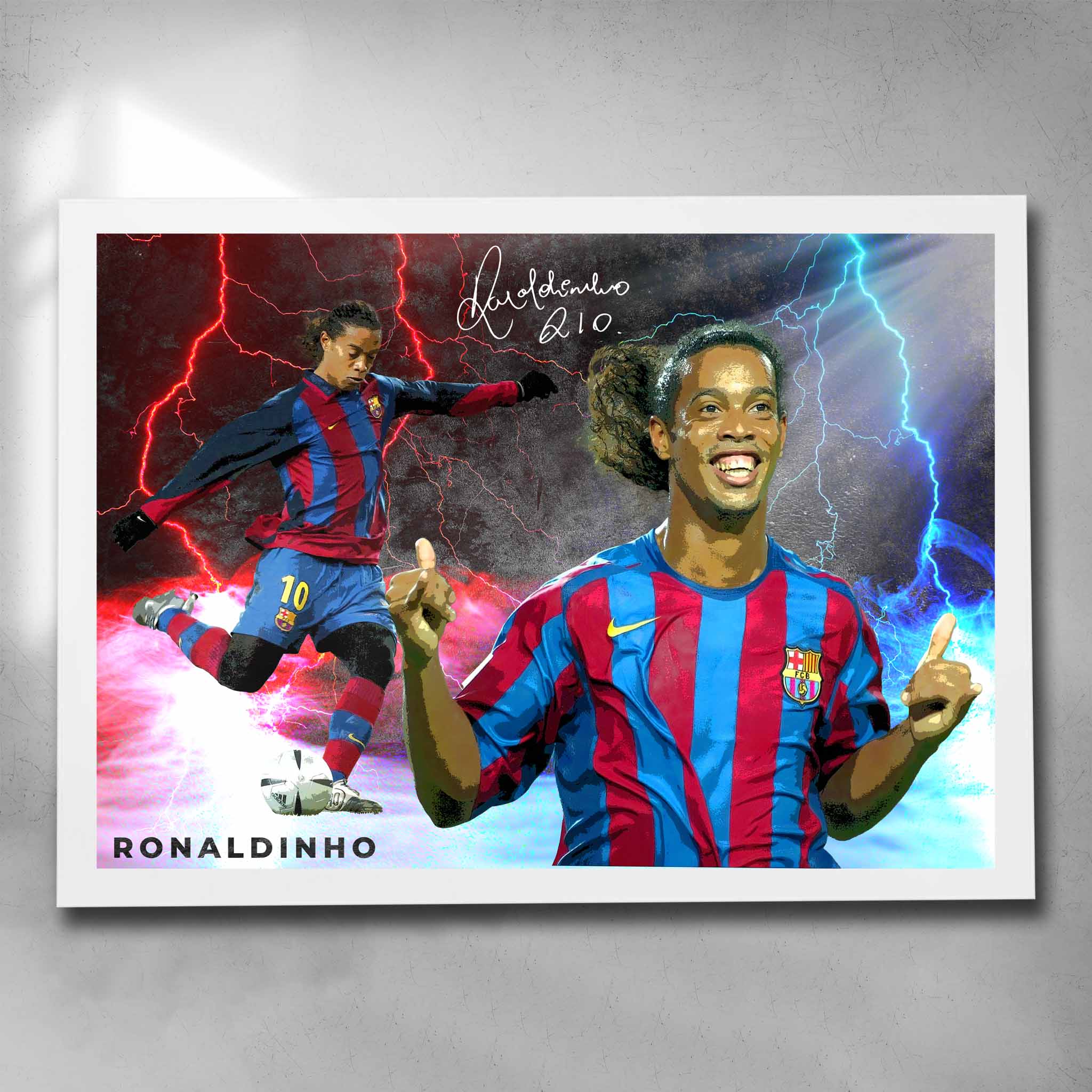 White framed soccer art by Sports Cave, featuring the football legend Ronaldinho from Barcelona FC.