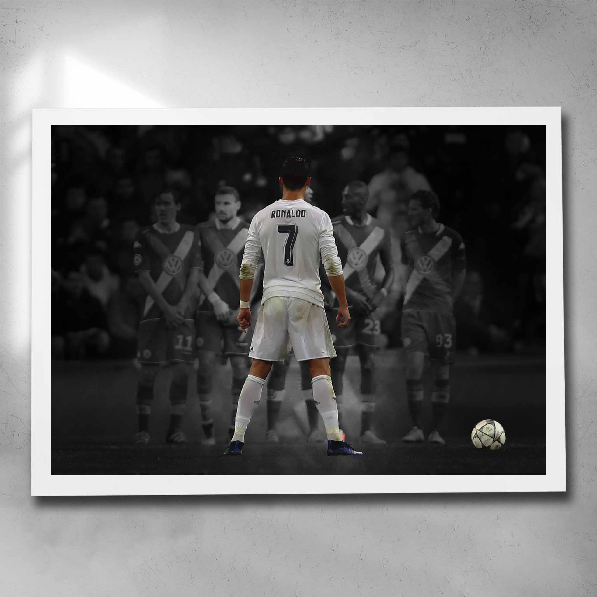 White framed soccer art by Sports Cave, featuring Cristiano Ronaldo taking a free kick.