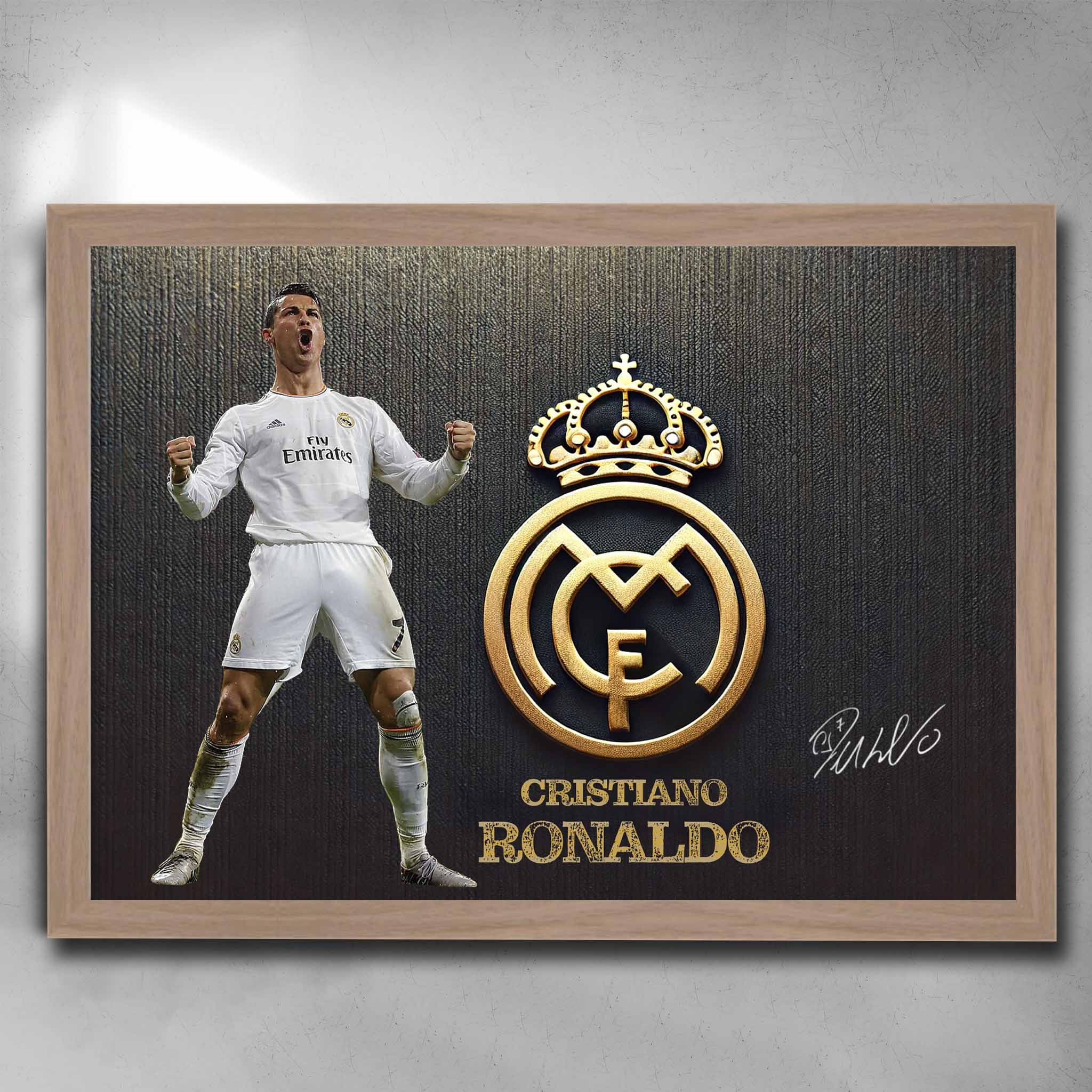 Cristiano Ronaldo framed art print in oak featuring Real Madrid gold crest and signature. Perfect for football fans and collectors. Available framed or unframed