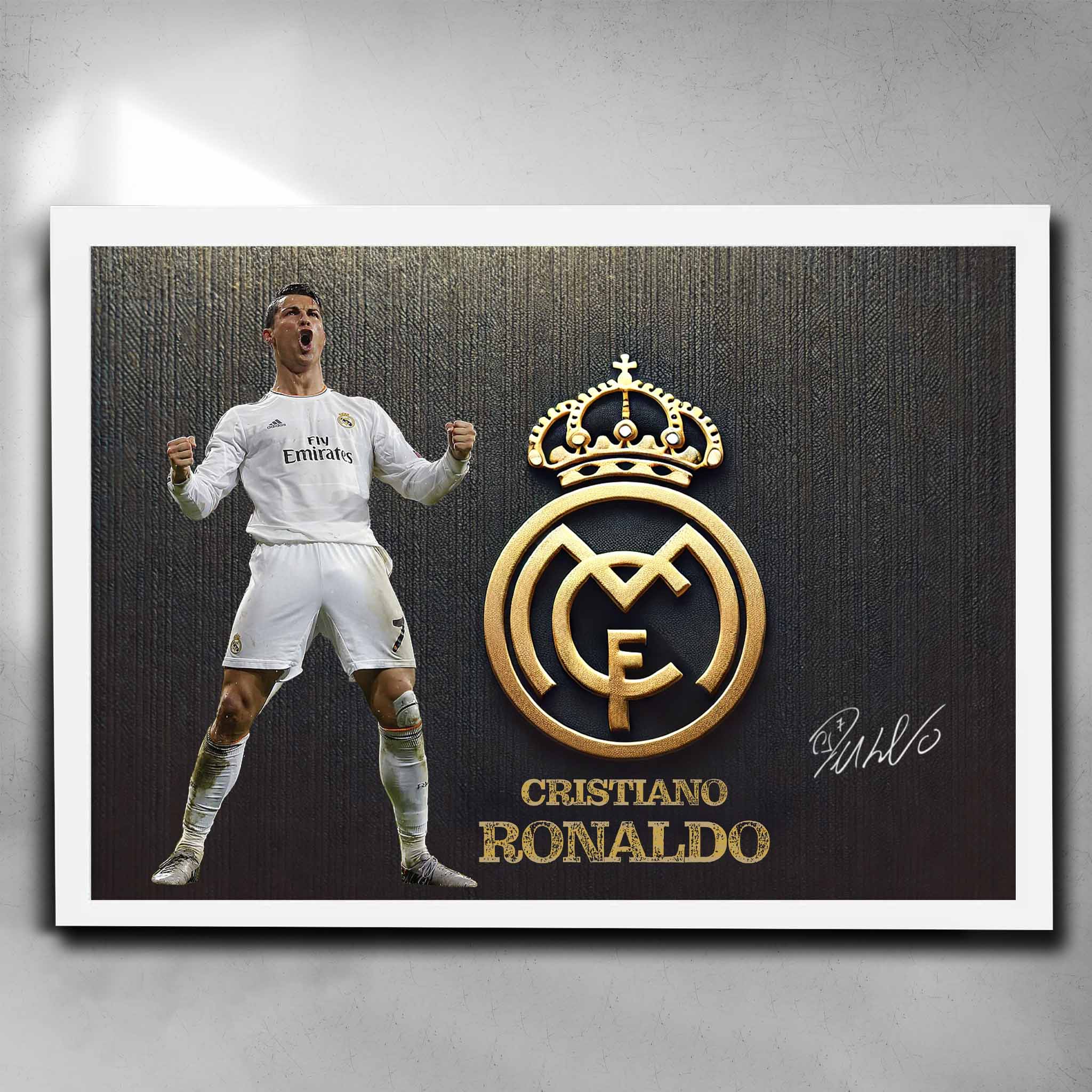 Cristiano Ronaldo framed art print in white featuring Real Madrid gold crest and signature. Perfect for football fans and collectors. Available framed or unframed