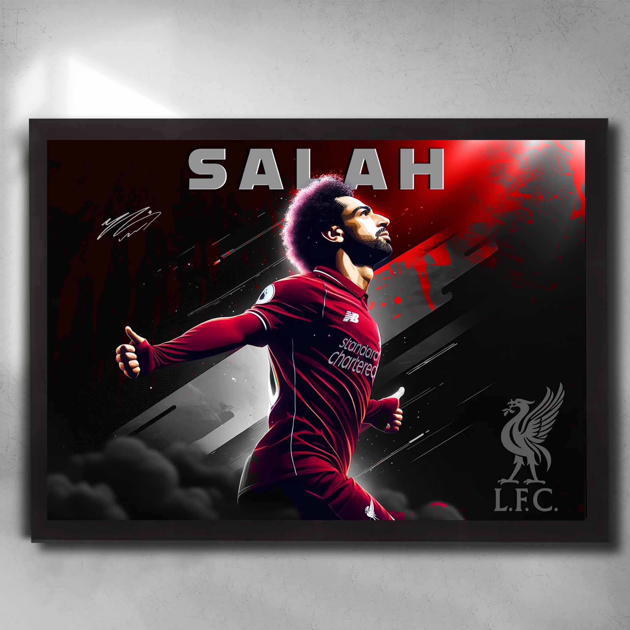 Black framed soccer art featuring a signed print of Mohamed Salah from Liverpool FC - Artwork by Sports Cave.