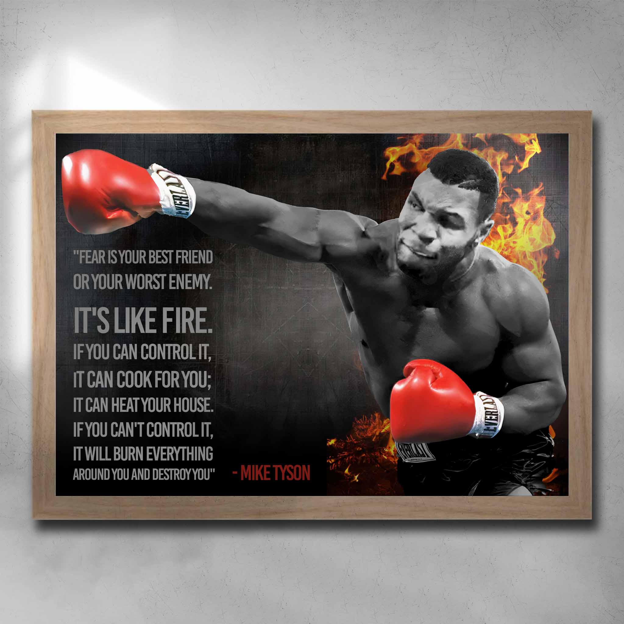 Oak framed motivational art by Sports Cave, featuring the boxing legend Mike Tyson with his quote "fear is like fire".