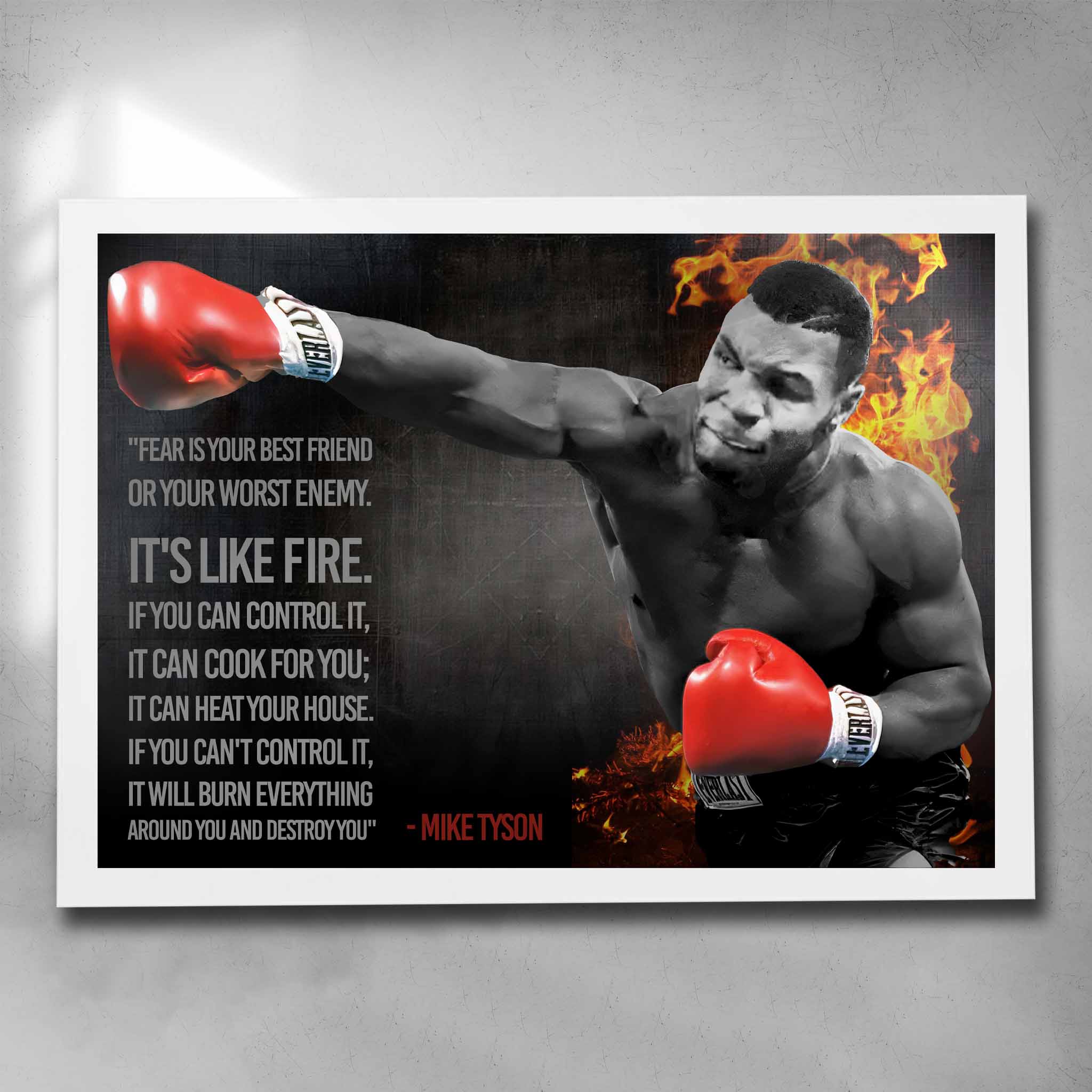 White framed motivational art by Sports Cave, featuring the boxing legend Mike Tyson with his quote "fear is like fire".