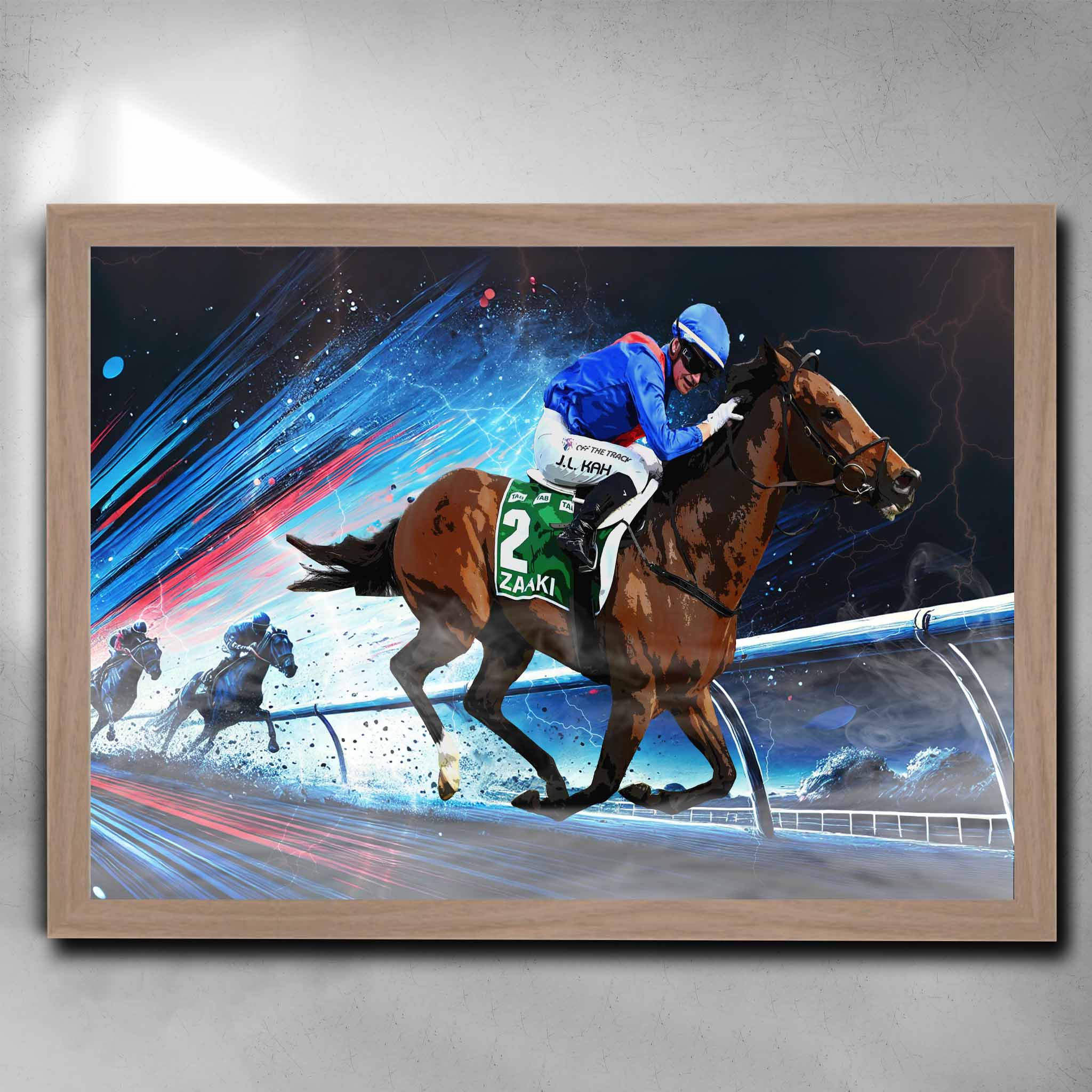 Zaaki horse racing art oak framed poster with Jamie Kah in blue and red silks, capturing dynamic mid-race action. Ideal for horse racing fans and man cave decor.